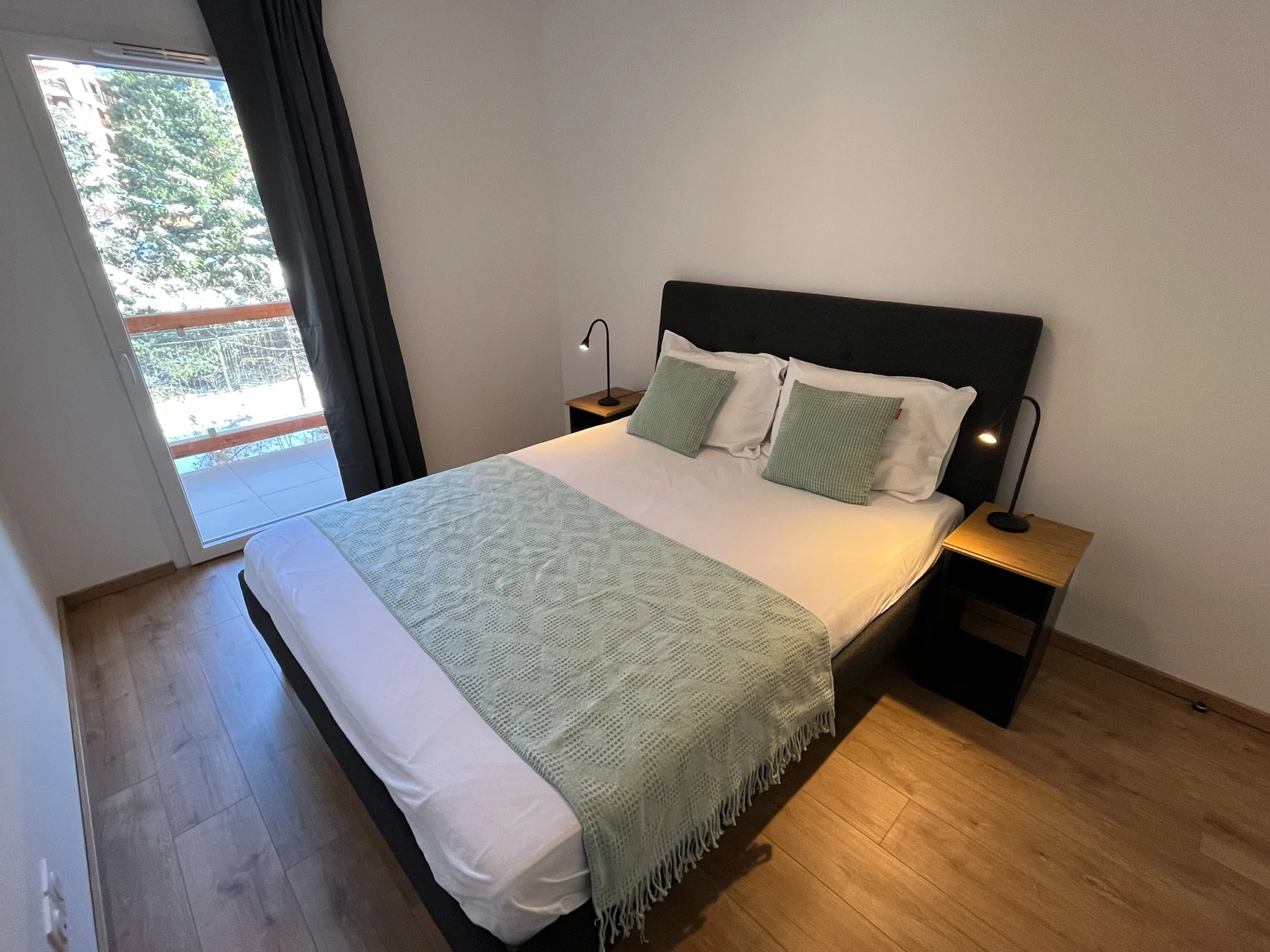Bedroom two with balcony access