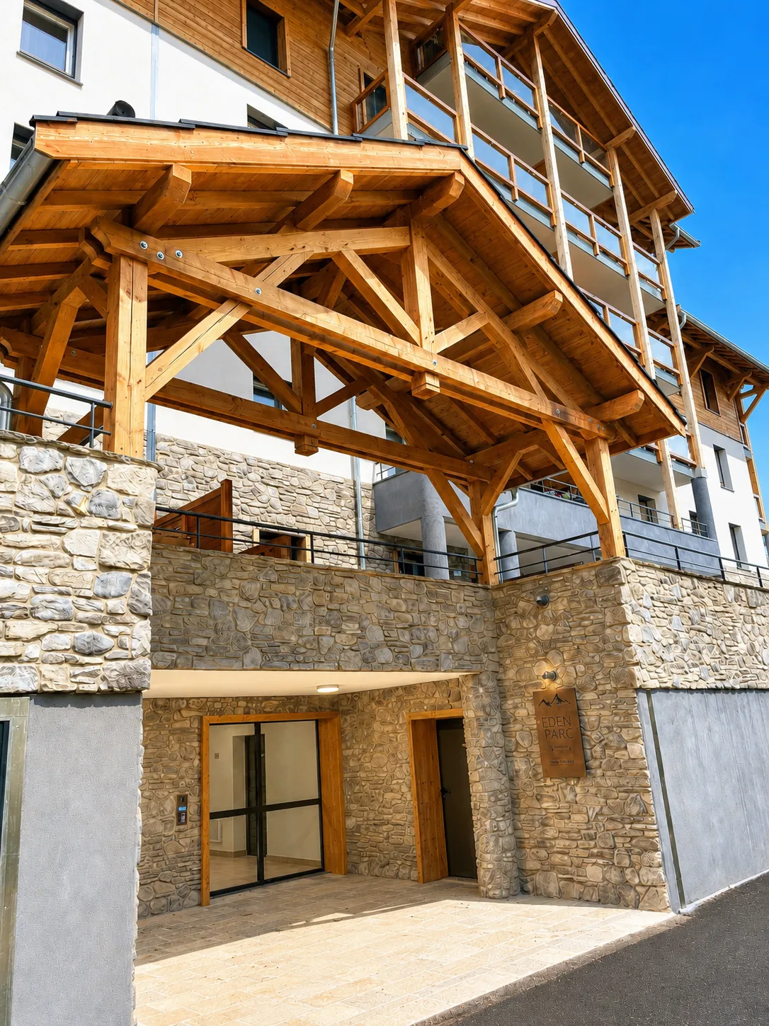 Sunlit entrance to Eden Parc Residence